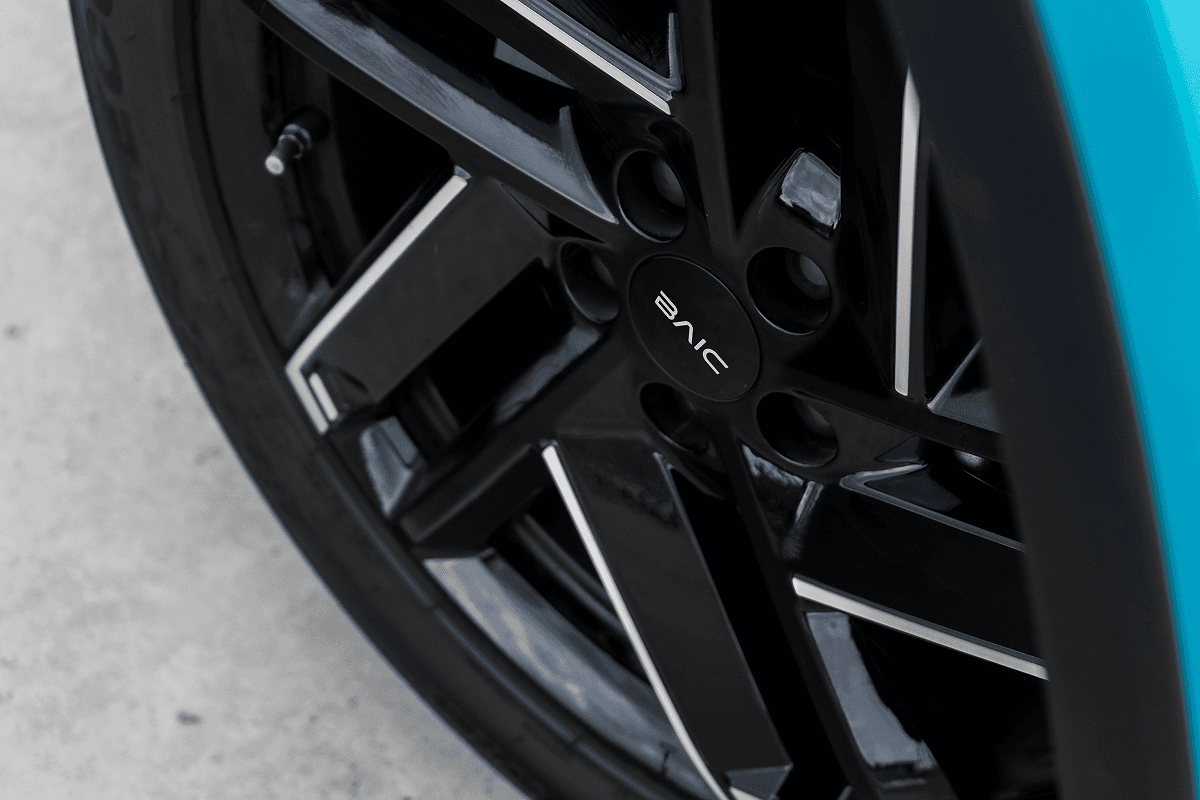 BAIC X55 side profile highlighting premium alloy wheels
